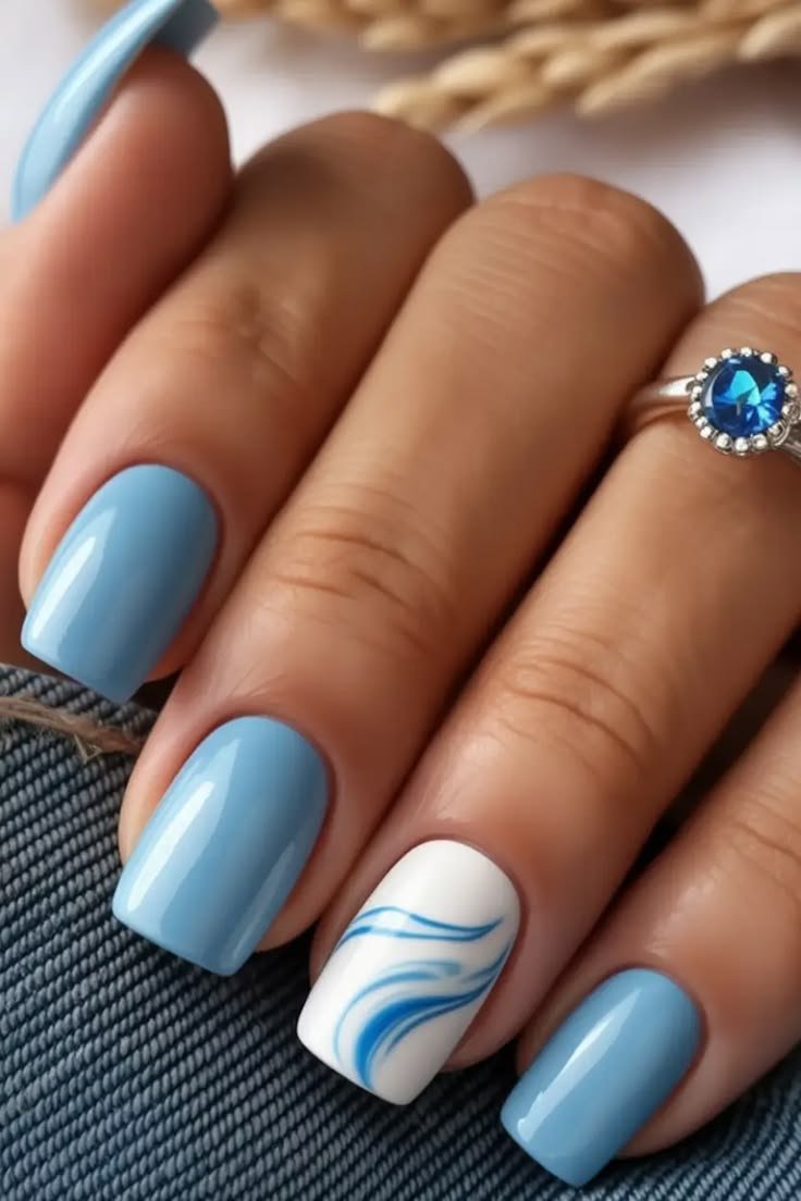 Sea inspired nails mixed with floral elements for a fusion look