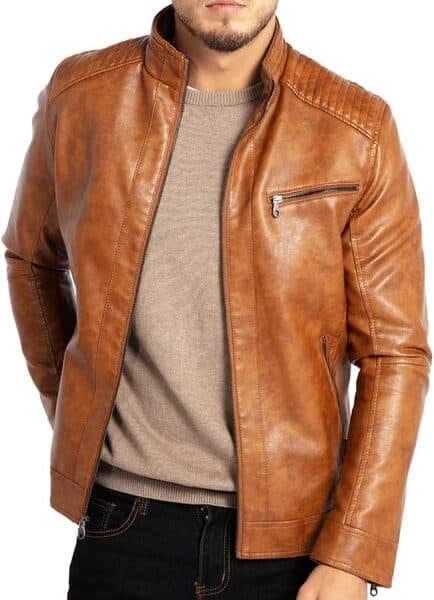 Model wearing a contemporary high collar jacket as part of a trendy outfit