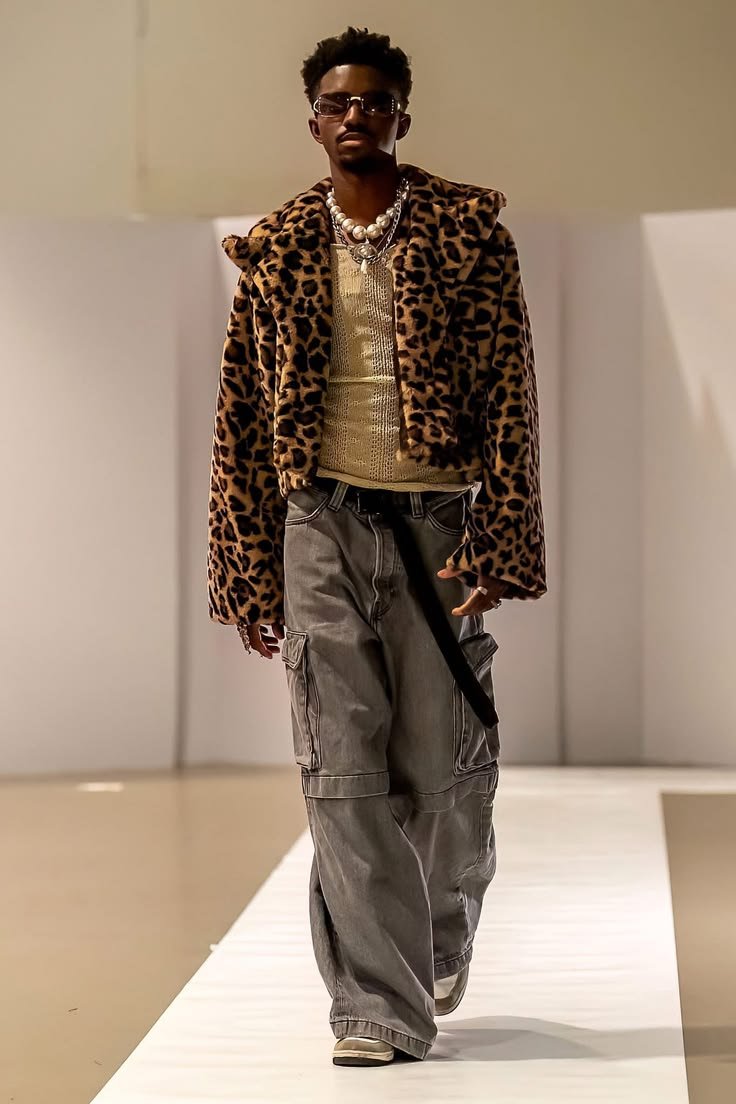 Striking leopard print dress with bold black accents, showcasing fierce animal inspired style.