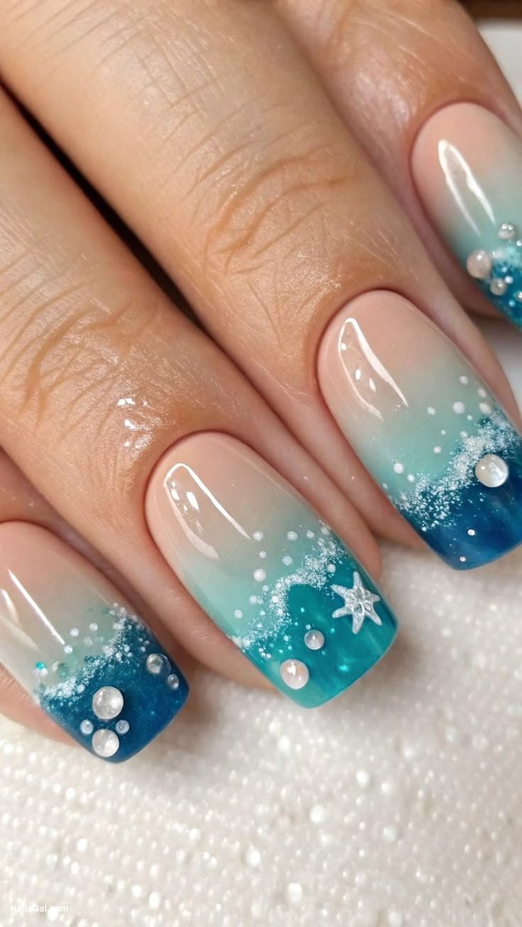 Cute sea inspired nails on short natural nail beds