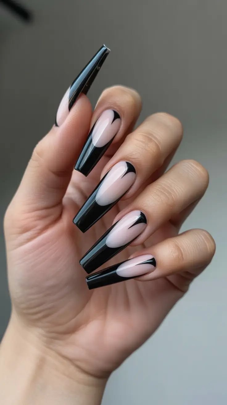 Halloween-themed gothic coffin nails featuring spooky elements like skulls and dripping blood designs.