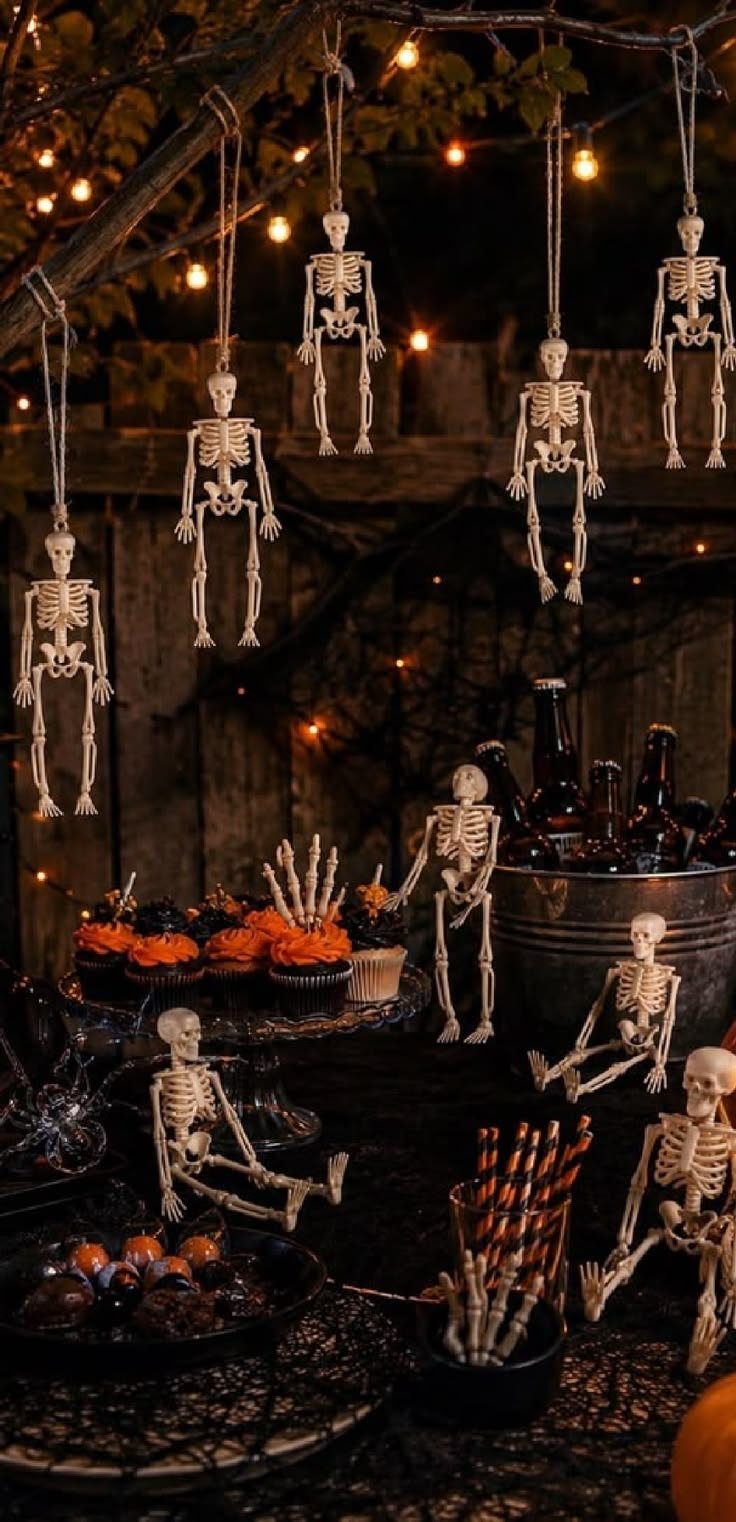 Black tattered cloth draped over a fireplace for elegant Halloween party decor