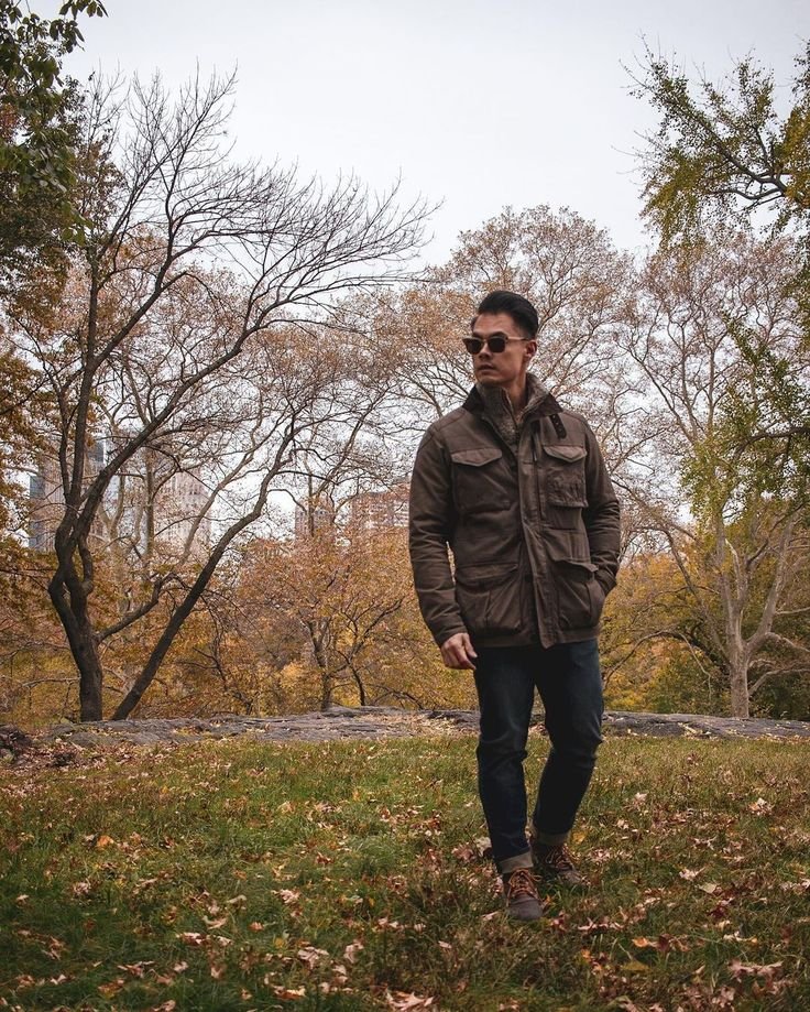 Professional field jacket outfit over a dress shirt and tie, suitable for business casual environments.
