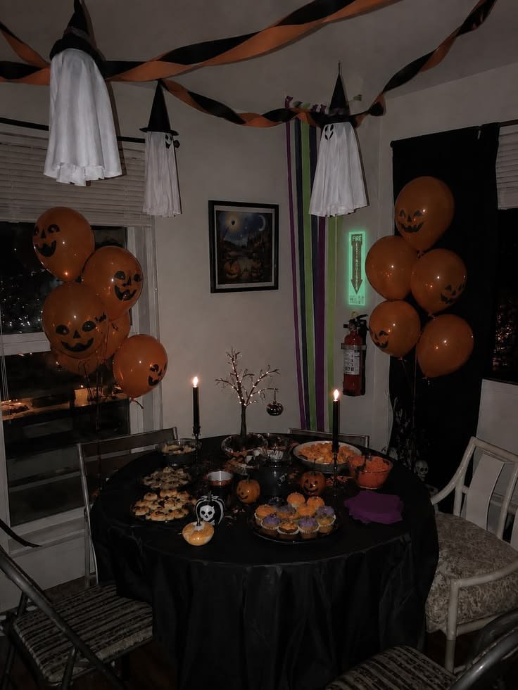 Mini cast iron cauldrons used to serve dips and Halloween party decor food