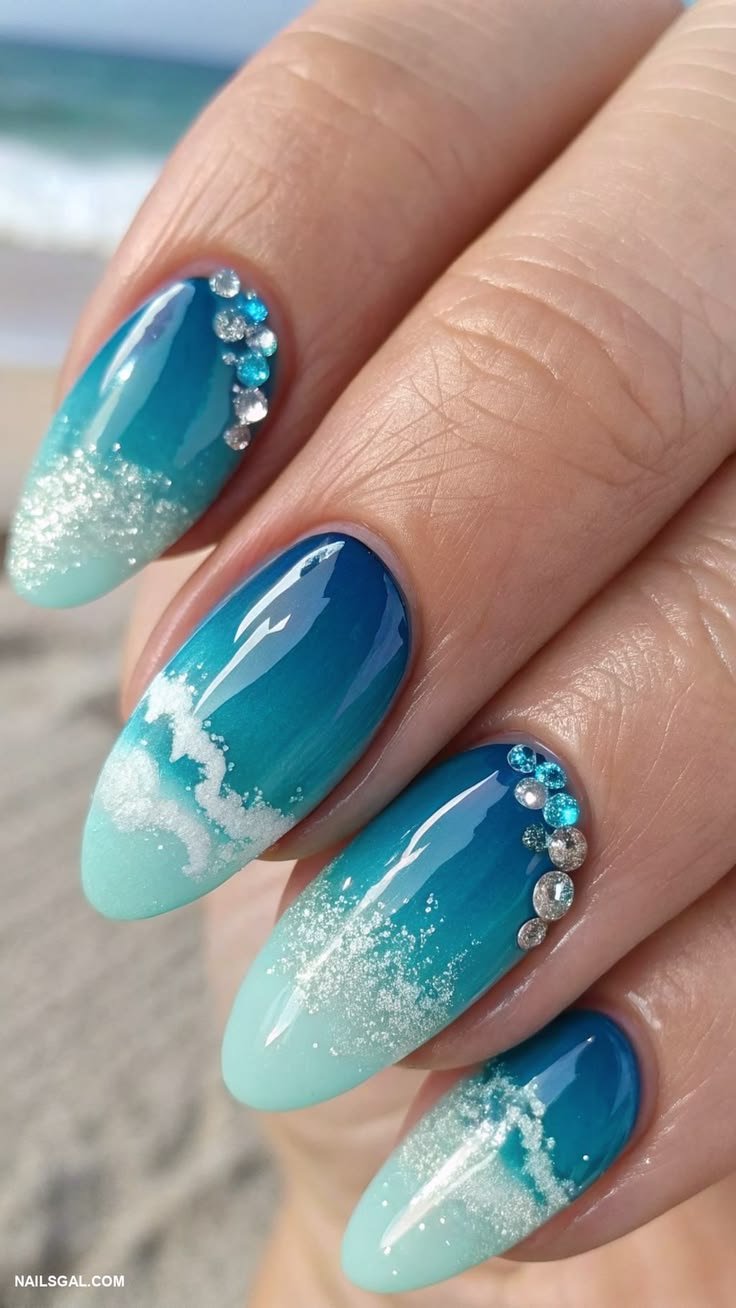 Sea inspired nails viewed under different lighting conditions