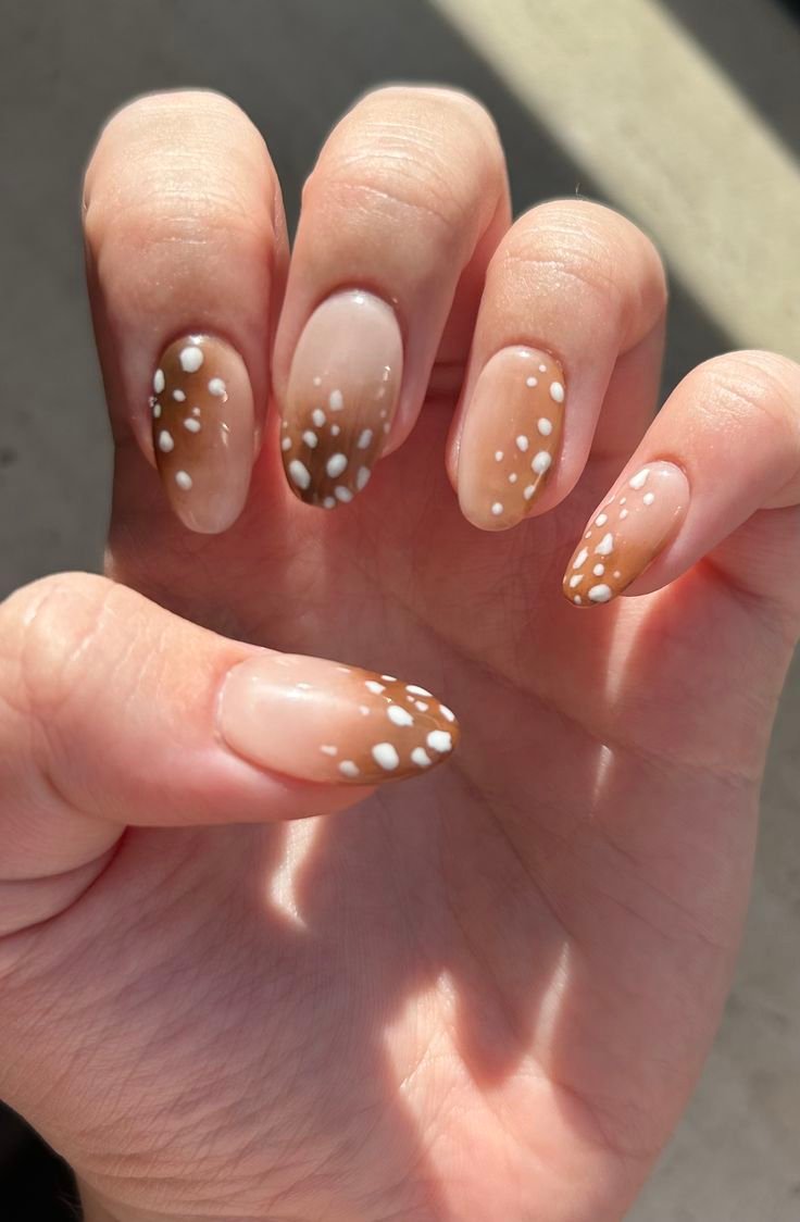 Flawlessly maintained deer naihs manicure displayed after two weeks of gel wear