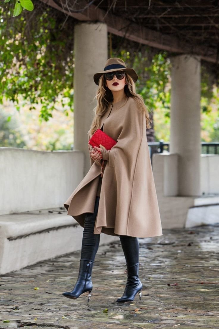 Bold and brave cape outfit making a strong fashion statement with its dramatic silhouette.