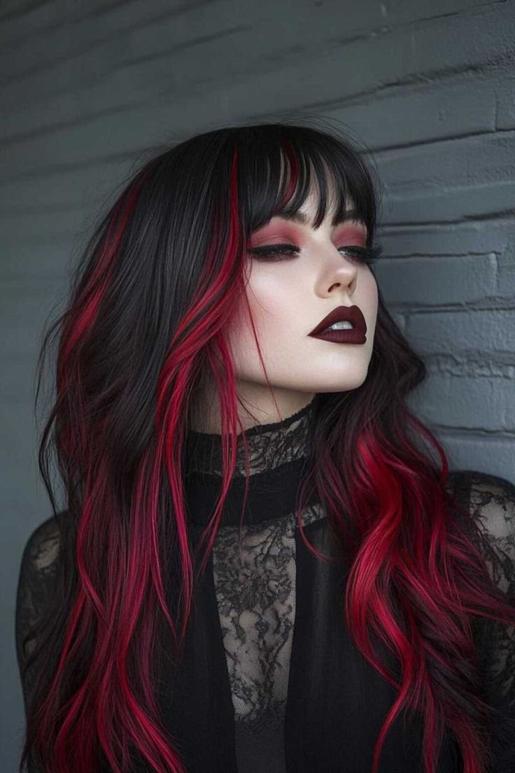 Lips painted in a deep, dark red shade, illustrating a classic vampire beauty lip style