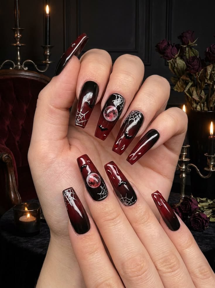 Long black gothic coffin nails with sharp points, featuring a smooth, glossy, and durable finish.