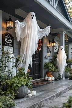 Hanging bat silhouettes suspended from porch eaves for halloween decorations outdoor