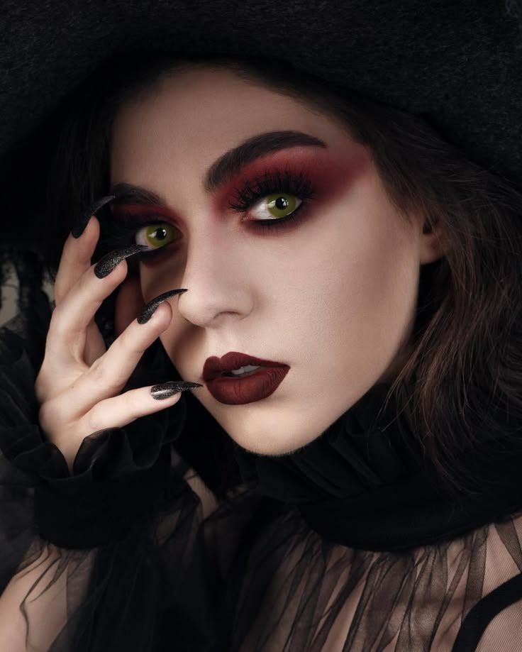 A Kpop idol with striking dark makeup, pale skin, and styled hair, showing vampire beauty kpop influence