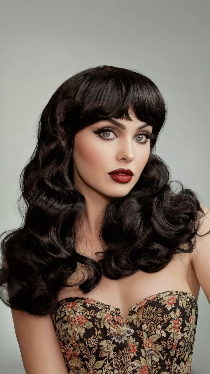 Woman with dark romantic makeup, highlighting its softer, more ethereal qualities
