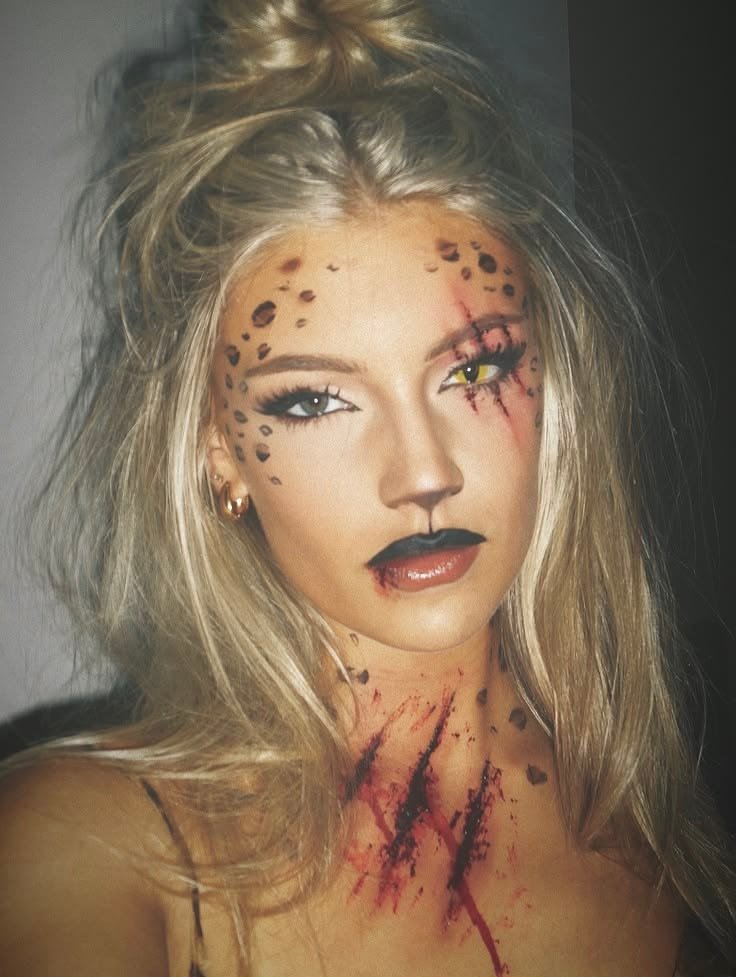 Magical deer makeup halloween look featuring ethereal highlights and soft focus photography style